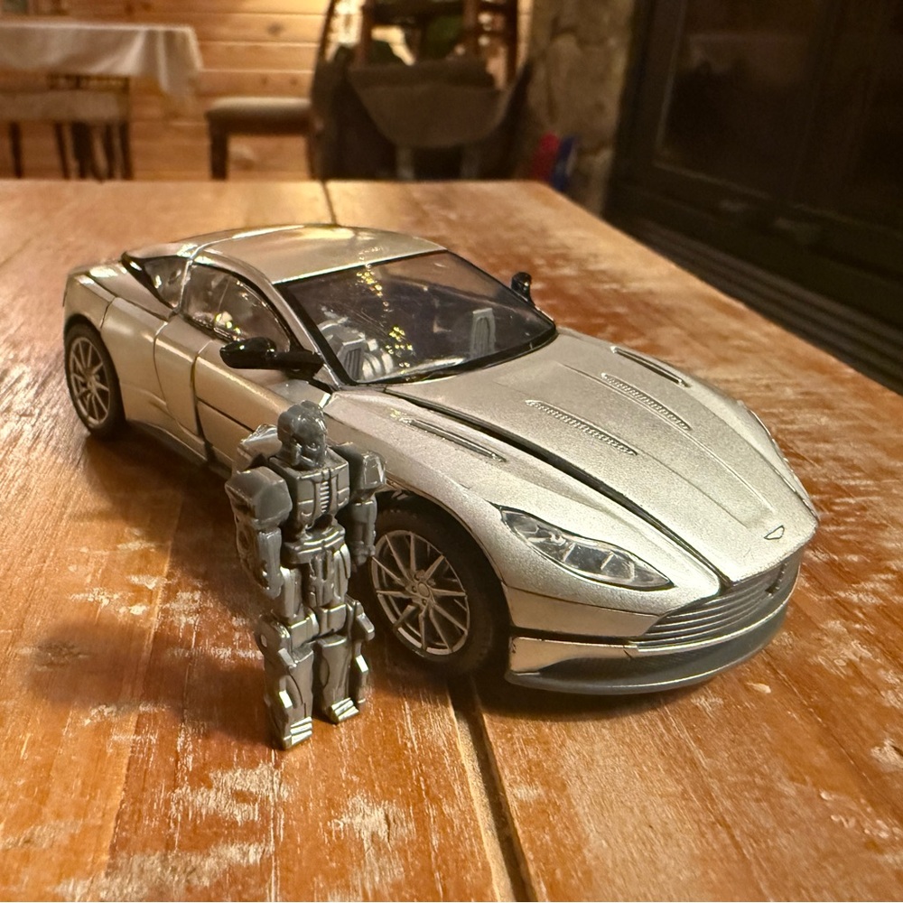 Sleek Silver Toy Car and Robot Duo